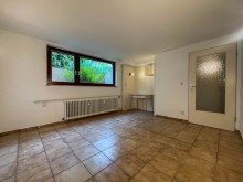 Souterrain-Einheit Lichtdurchflutete 3-Zimmer-Wohnung mit Wintergarten, Garten und Terrasse in ruhiger Lage