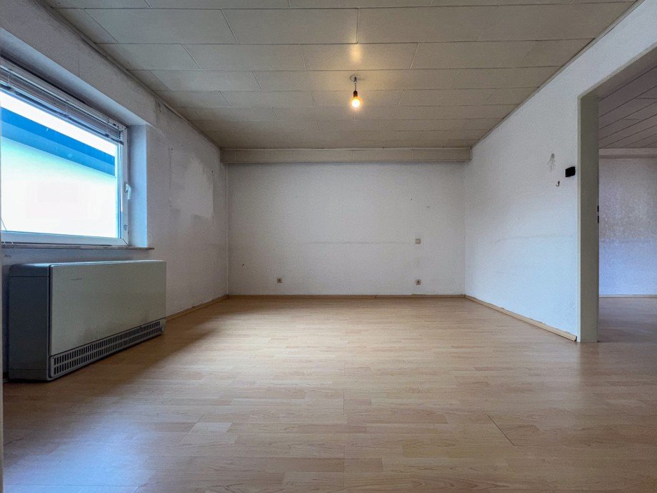 OG Wohnzimmer Mehrfamilienhaus Dreieich / Offenthal