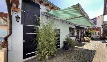 Hof zwischen Vorder/Hinterhaus Doppelhaush�lfte + Einfamilienhaus und eine Gewerbeimmobilie